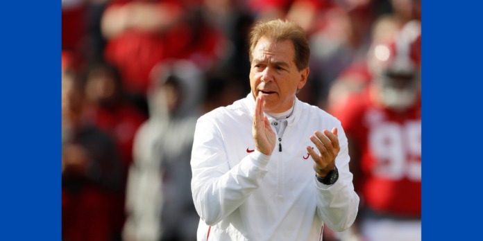 Nick Saban clapping Nick Saban claps during a football game