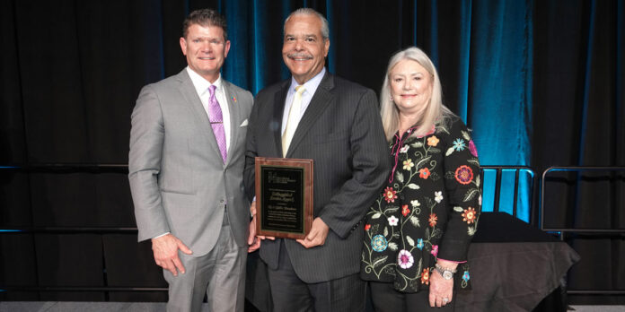 Greg-Brown-with-Rey-and-Cynthia-Almodovar-at-Chamber's-Annual-Membership-Meeting